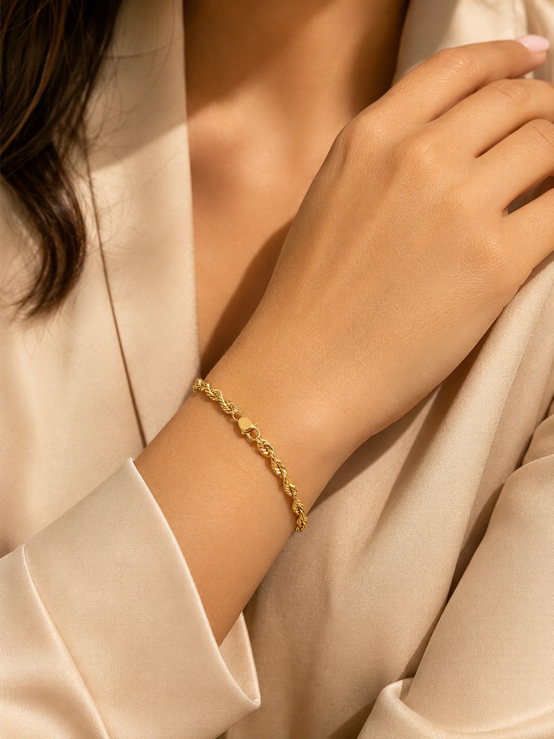 Esclava tipo torzal en oro real 14 k