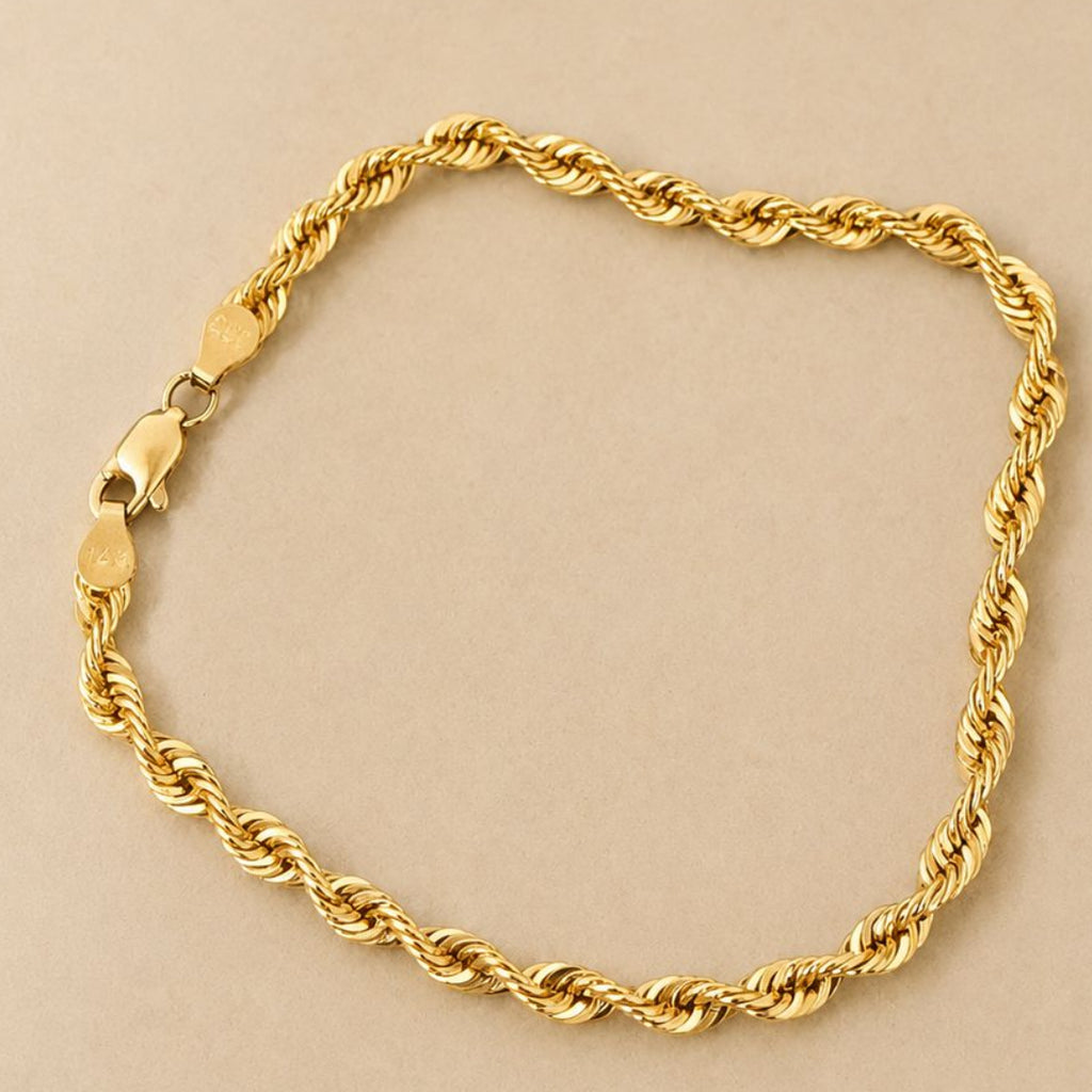 Esclava tipo torzal en oro real 14 k