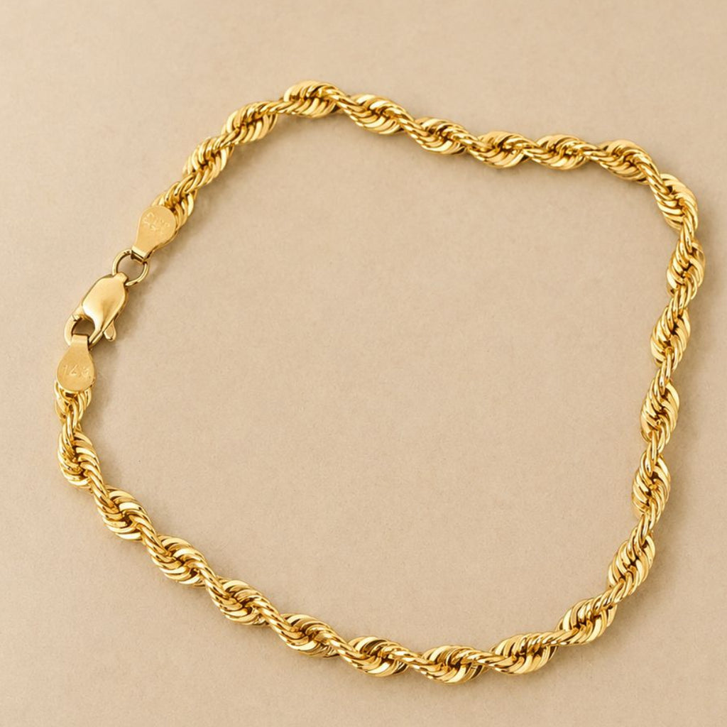 Esclava tipo torzal en oro real 14 k
