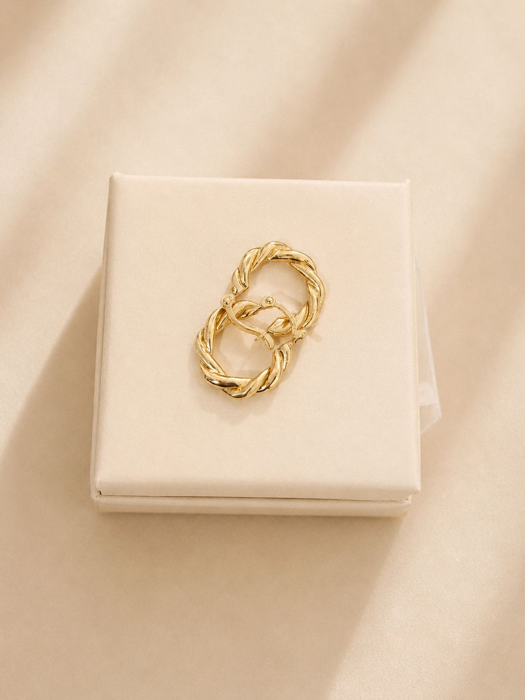 Arracadas trenzadas en oro real 14k